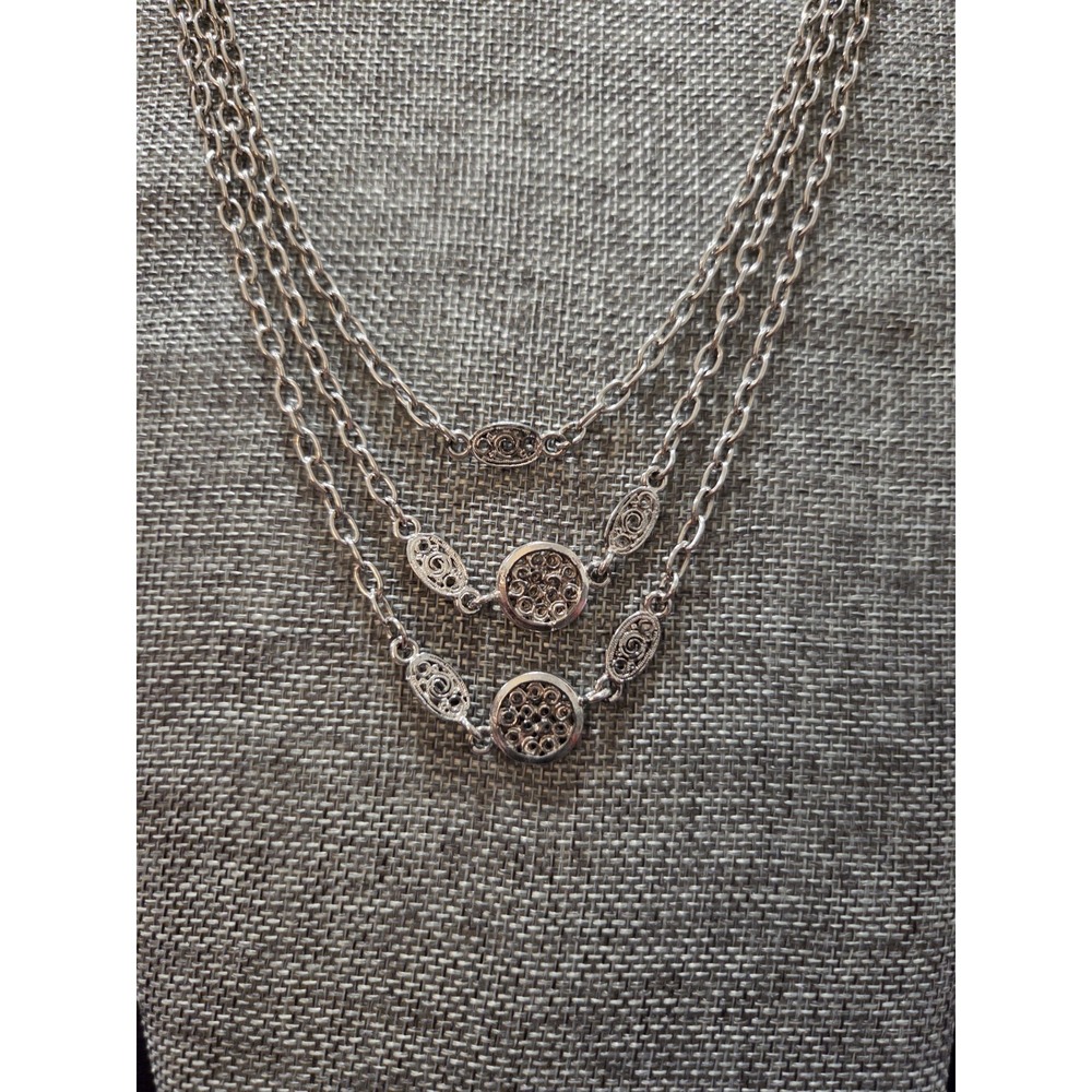 Long Silver Tone Necklace With Medalion Accents Layiering